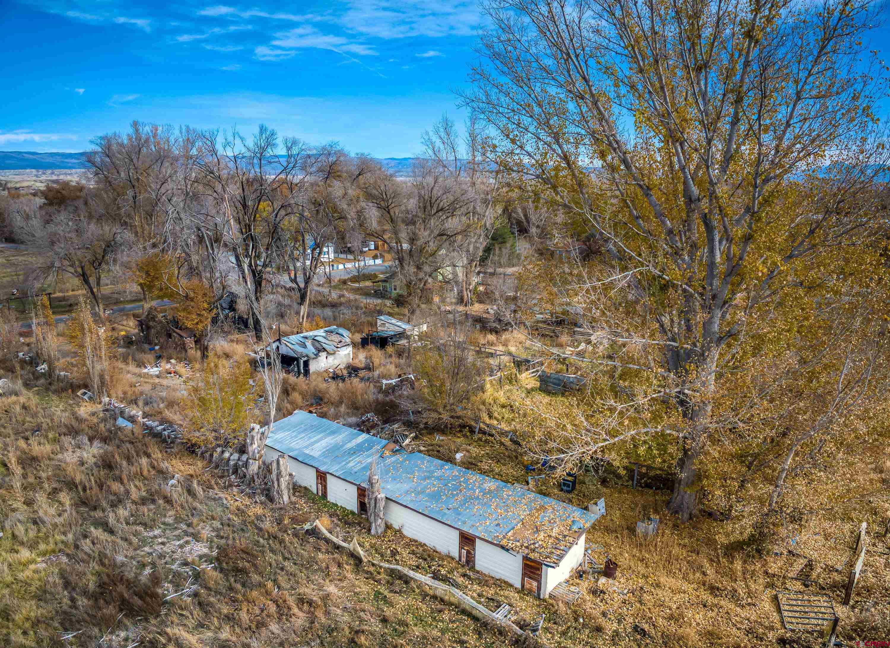 1663 H38 Road Delta, CO 81416 - Photo 1 of 20 a view of a bench in a backyard
