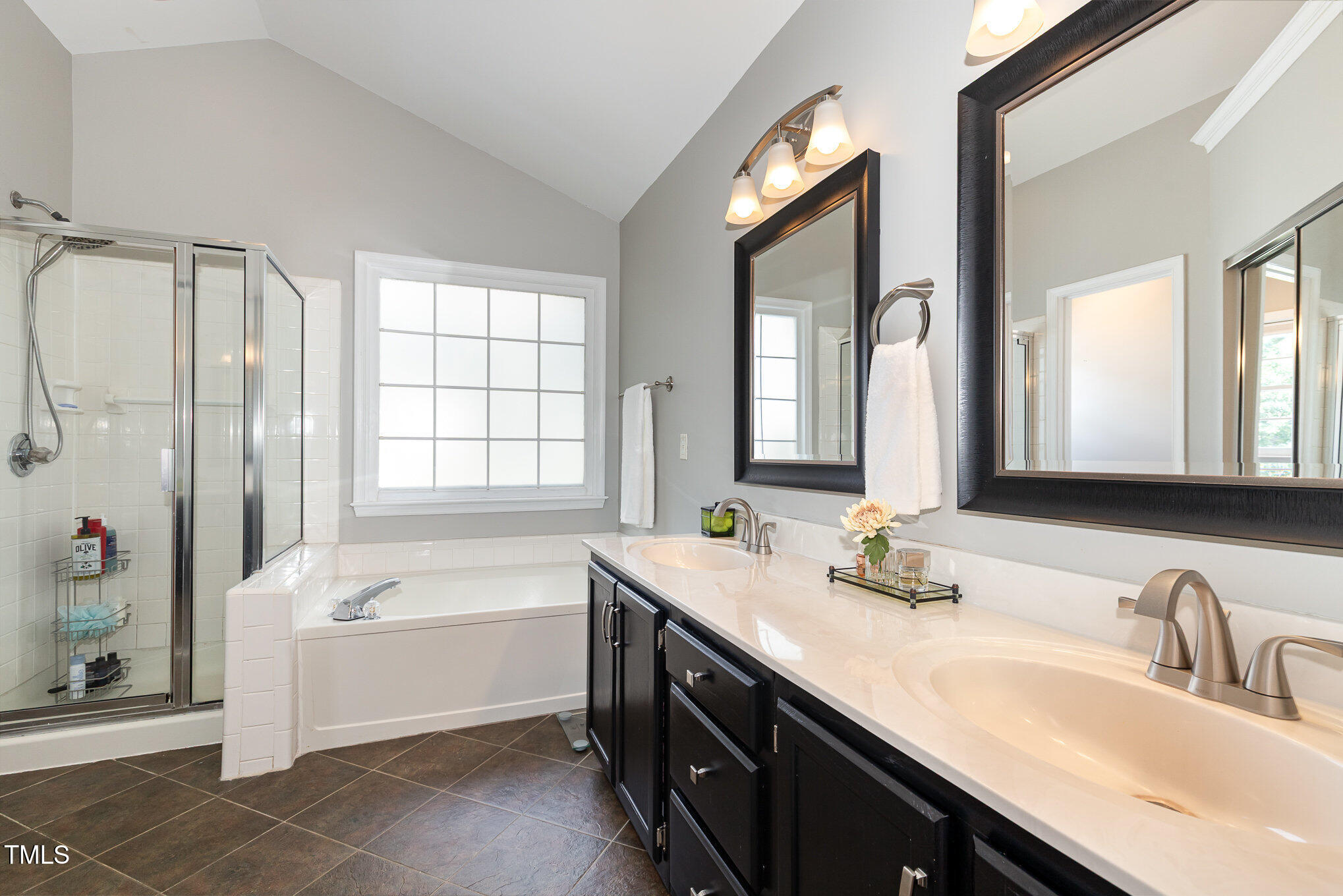 5609 Edgebury Road Raleigh, NC 27613 - Photo 24 of 31 Primary bath with double vanity.