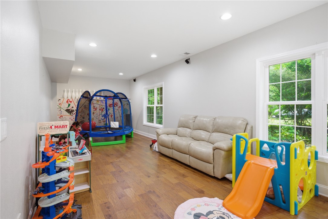 207 Devonhurst Drive Seneca, SC 29678 - Photo 33 of 50 This versatile room features warm flooring and abundant natural light, creating an inviting atmosphere.
