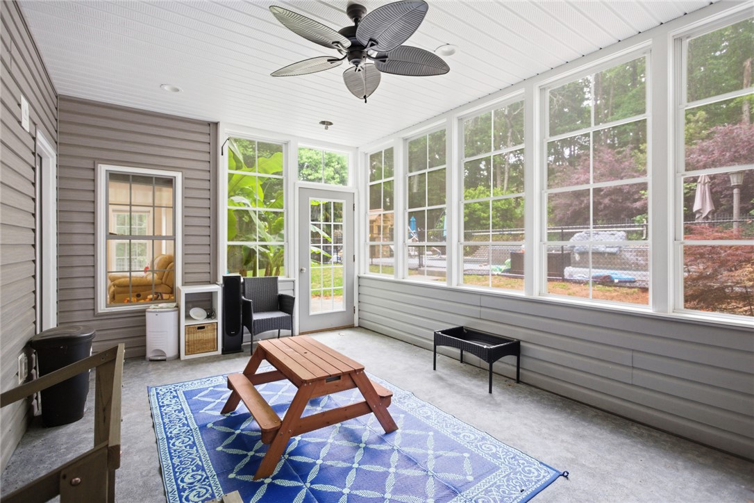 207 Devonhurst Drive Seneca, SC 29678 - Photo 37 of 50 This sunroom offers an inviting space with expansive views of the outdoors.