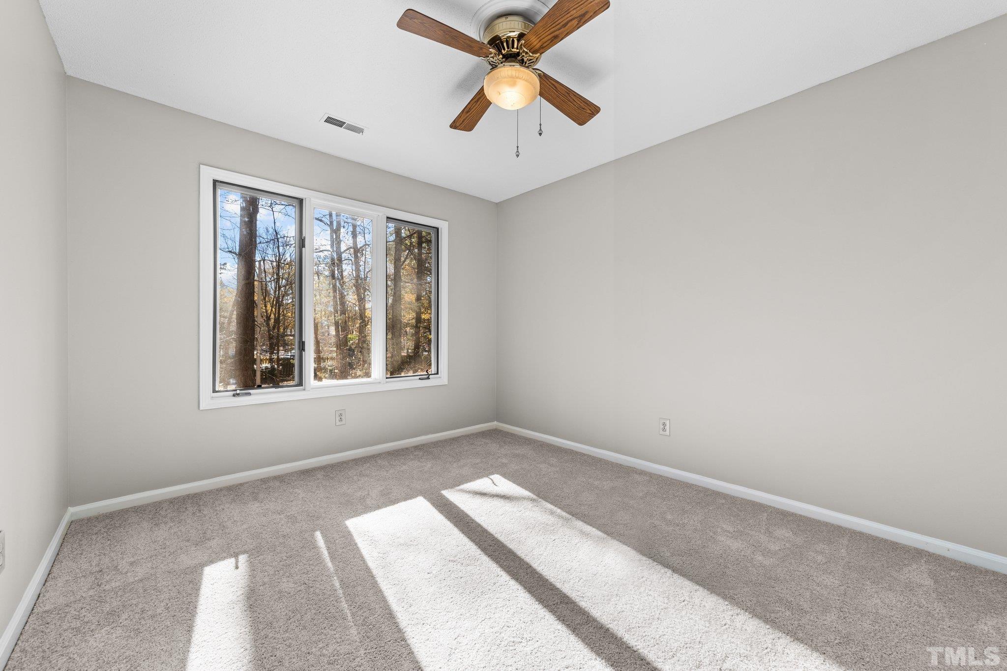 320 Summerfield Crossing Road Chapel Hill, NC 27514 - Photo 13 of 17 a view of workspace with window and a ceiling fan