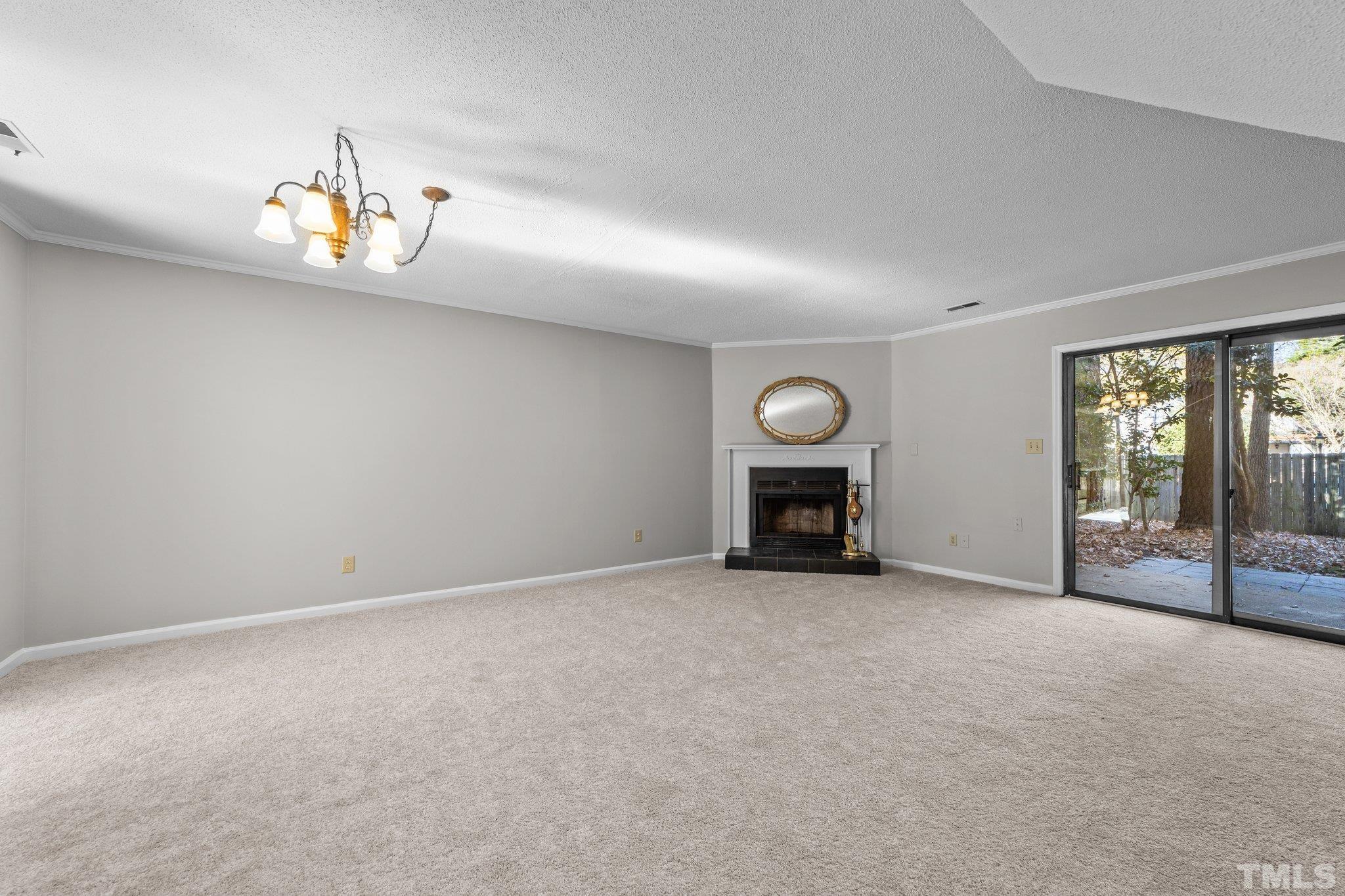 320 Summerfield Crossing Road Chapel Hill, NC 27514 - Photo 7 of 17 an empty room with entrance and windows