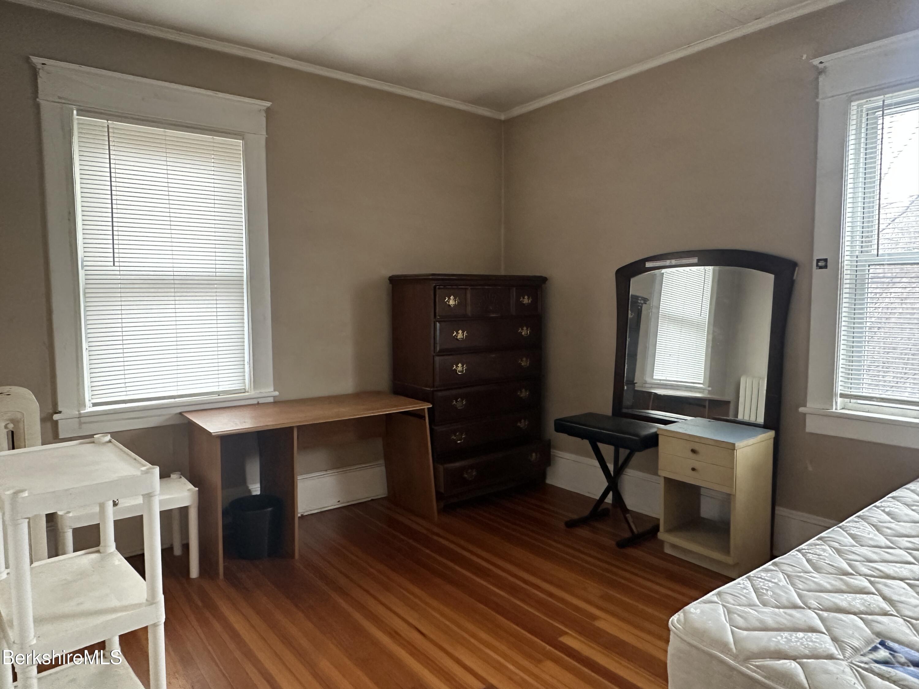 165-167 Appleton Avenue Pittsfield, MA 01201 - Photo 16 of 35 a view of a workspace with furniture and a window