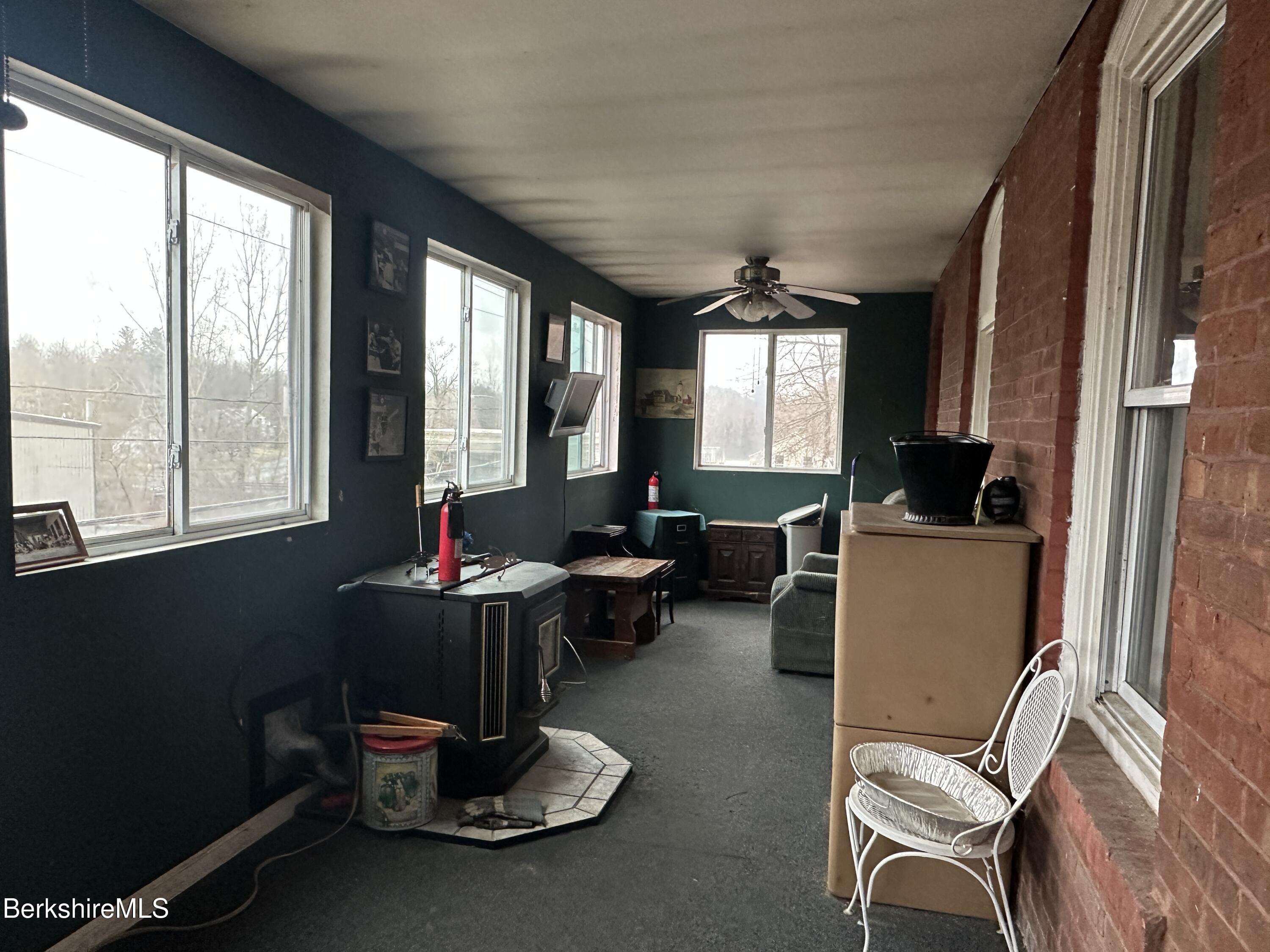 165-167 Appleton Avenue Pittsfield, MA 01201 - Photo 20 of 35 a living room with furniture and a large window