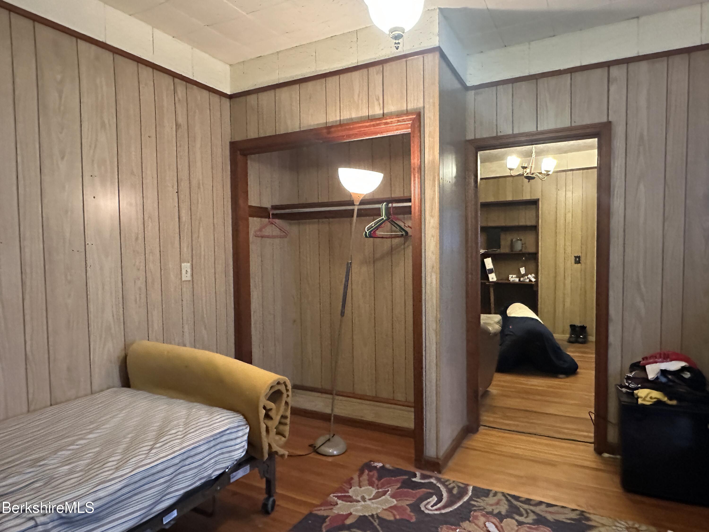165-167 Appleton Avenue Pittsfield, MA 01201 - Photo 26 of 35 a bedroom with a bed and a walk in closet