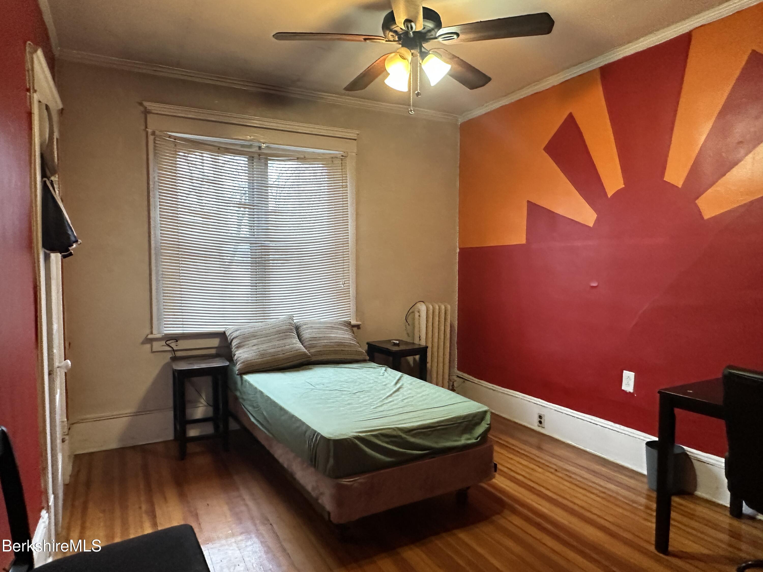 165-167 Appleton Avenue Pittsfield, MA 01201 - Photo 33 of 35 a bedroom with a bed and a window