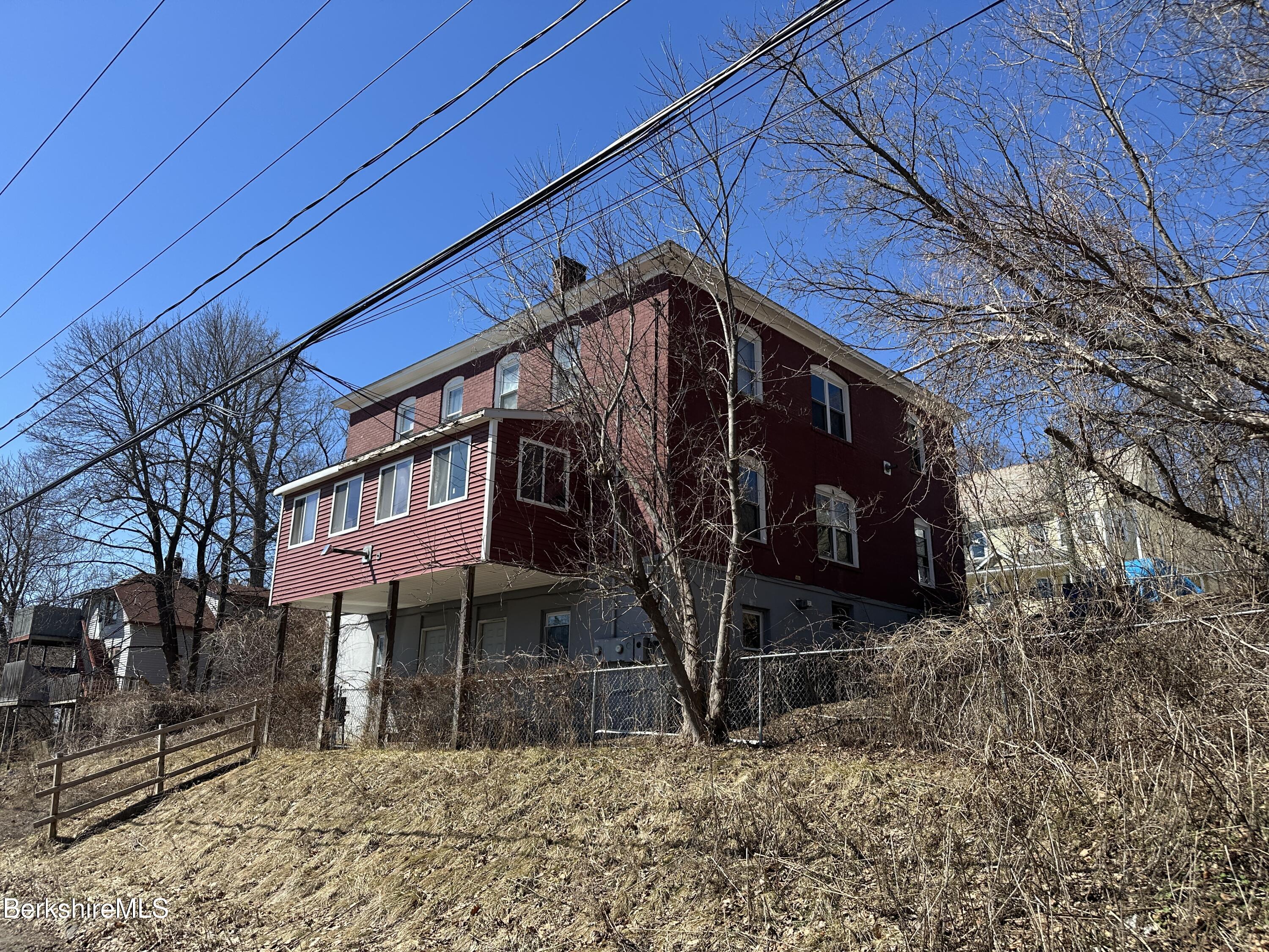 165-167 Appleton Avenue Pittsfield, MA 01201 - Photo 5 of 35 a view of a house with a snow