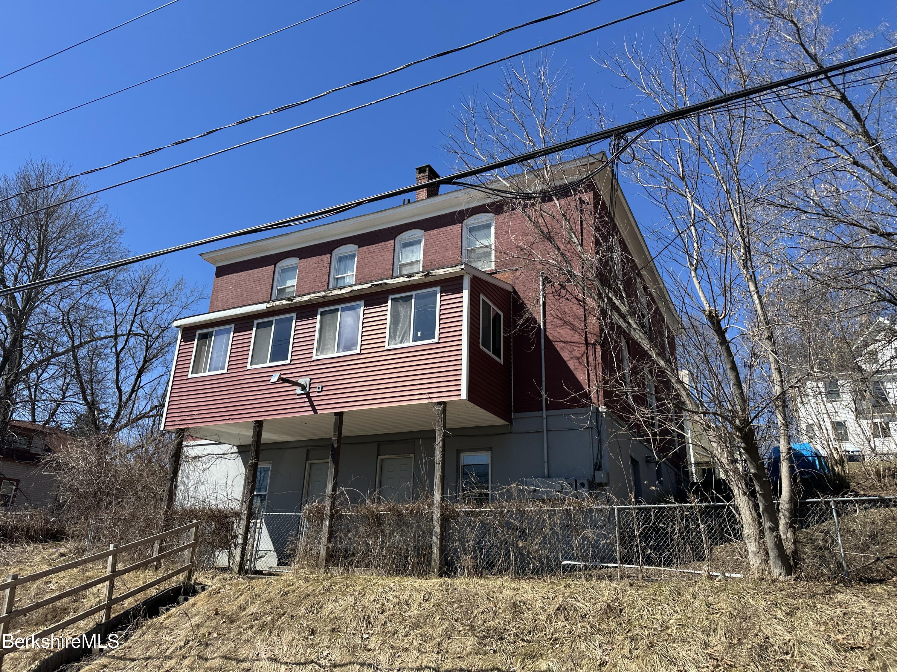 165-167 Appleton Avenue Pittsfield, MA 01201 - Photo 7 of 35 a front view of a house with garage