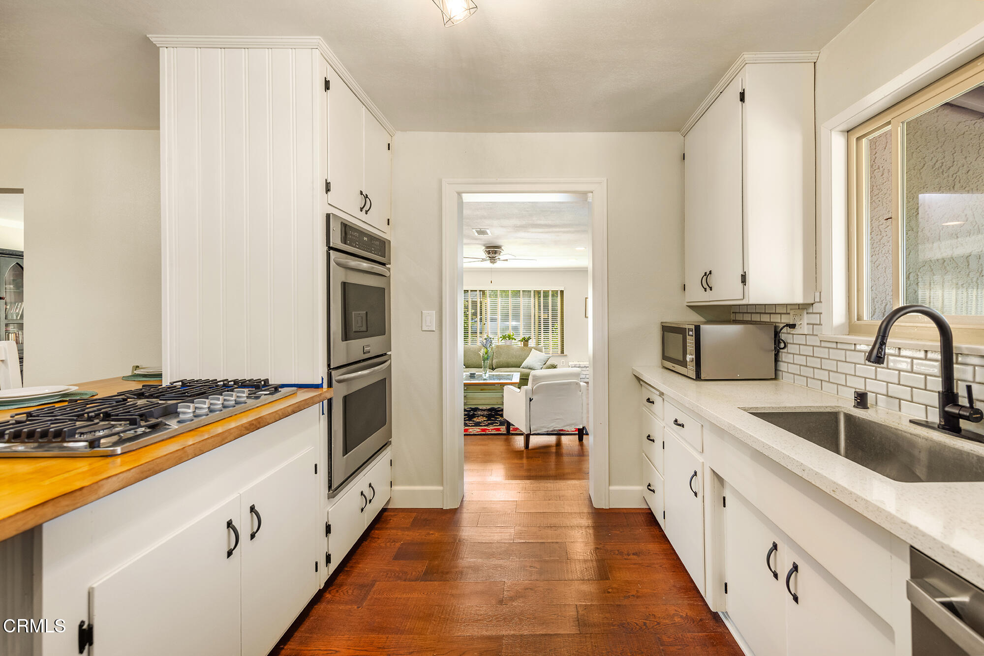 45 Rio Via Oak View, CA 93022 - Photo 12 of 34 a kitchen with stainless steel appliances granite countertop a sink stove and refrigerator