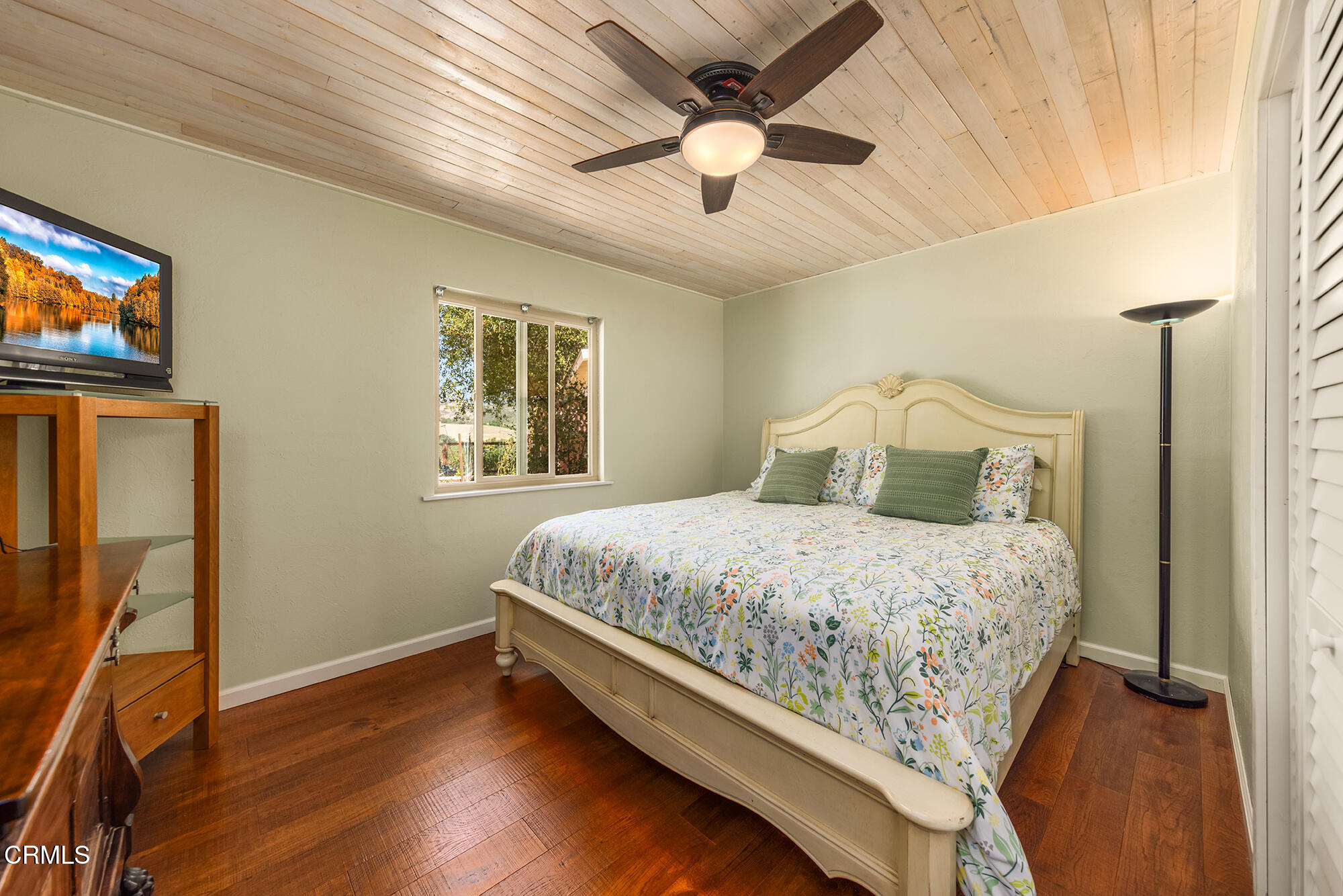 45 Rio Via Oak View, CA 93022 - Photo 21 of 34 a bedroom with a bed and a flat screen tv