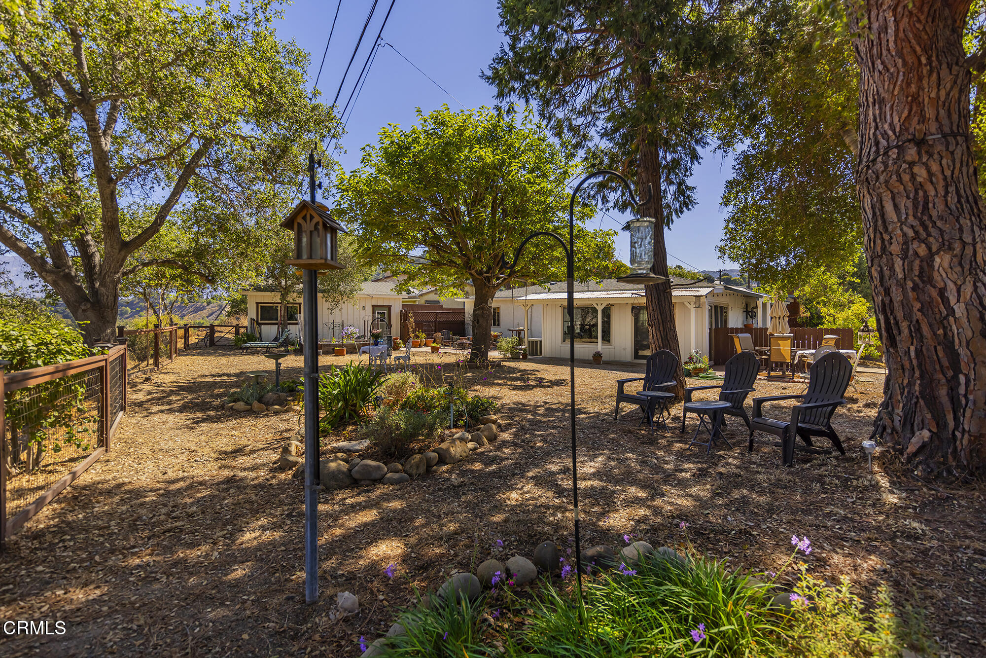 45 Rio Via Oak View, CA 93022 - Photo 6 of 34 a backyard of a house with table and chairs