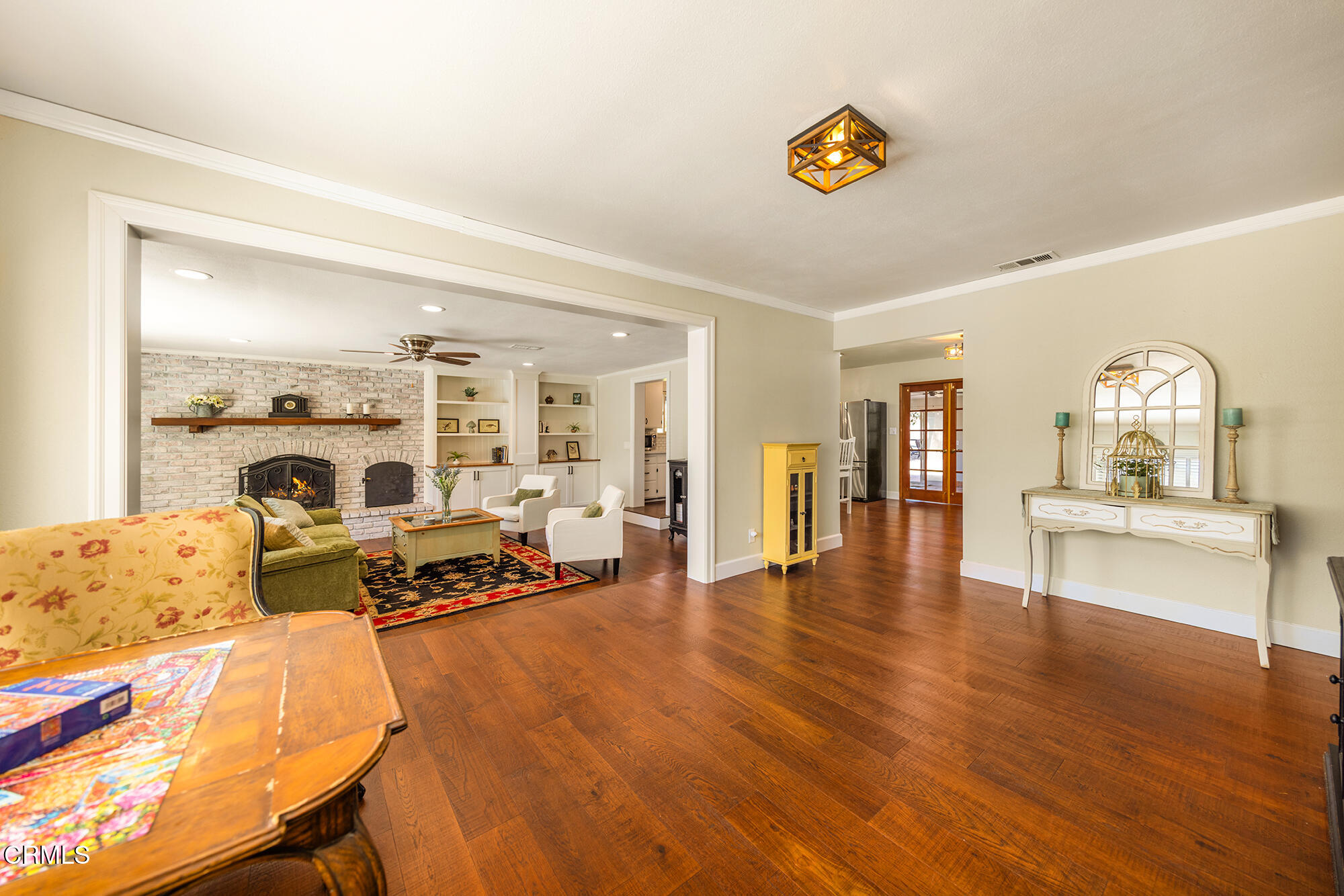 45 Rio Via Oak View, CA 93022 - Photo 8 of 34 a view of living room filled with furniture and wooden floor