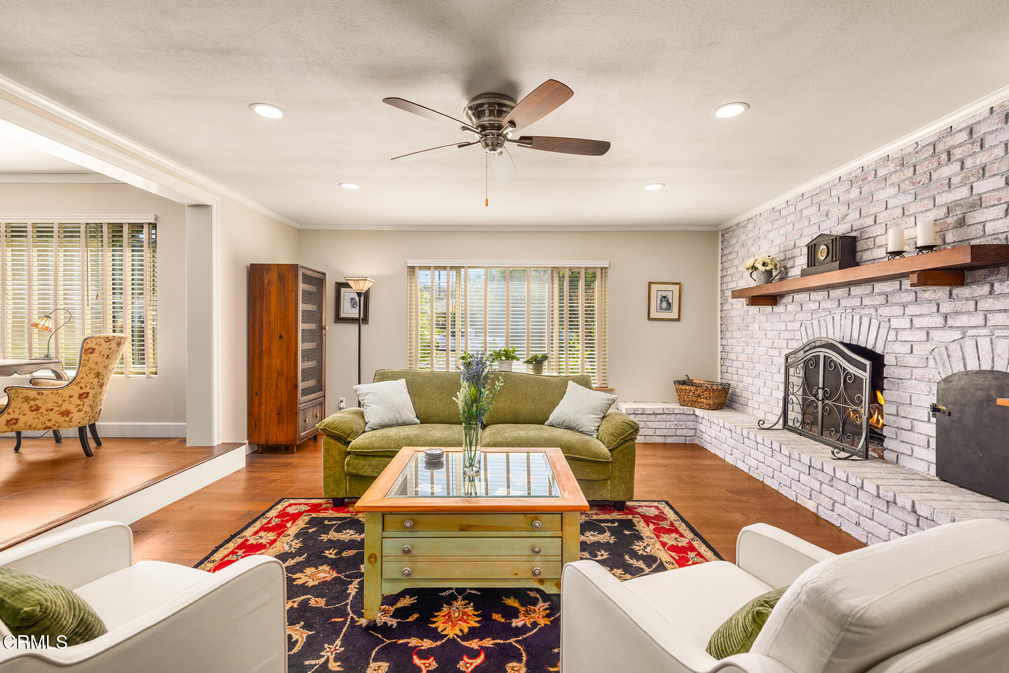 45 Rio Via Oak View, CA 93022 - Photo 10 of 34 a living room with furniture and a fireplace