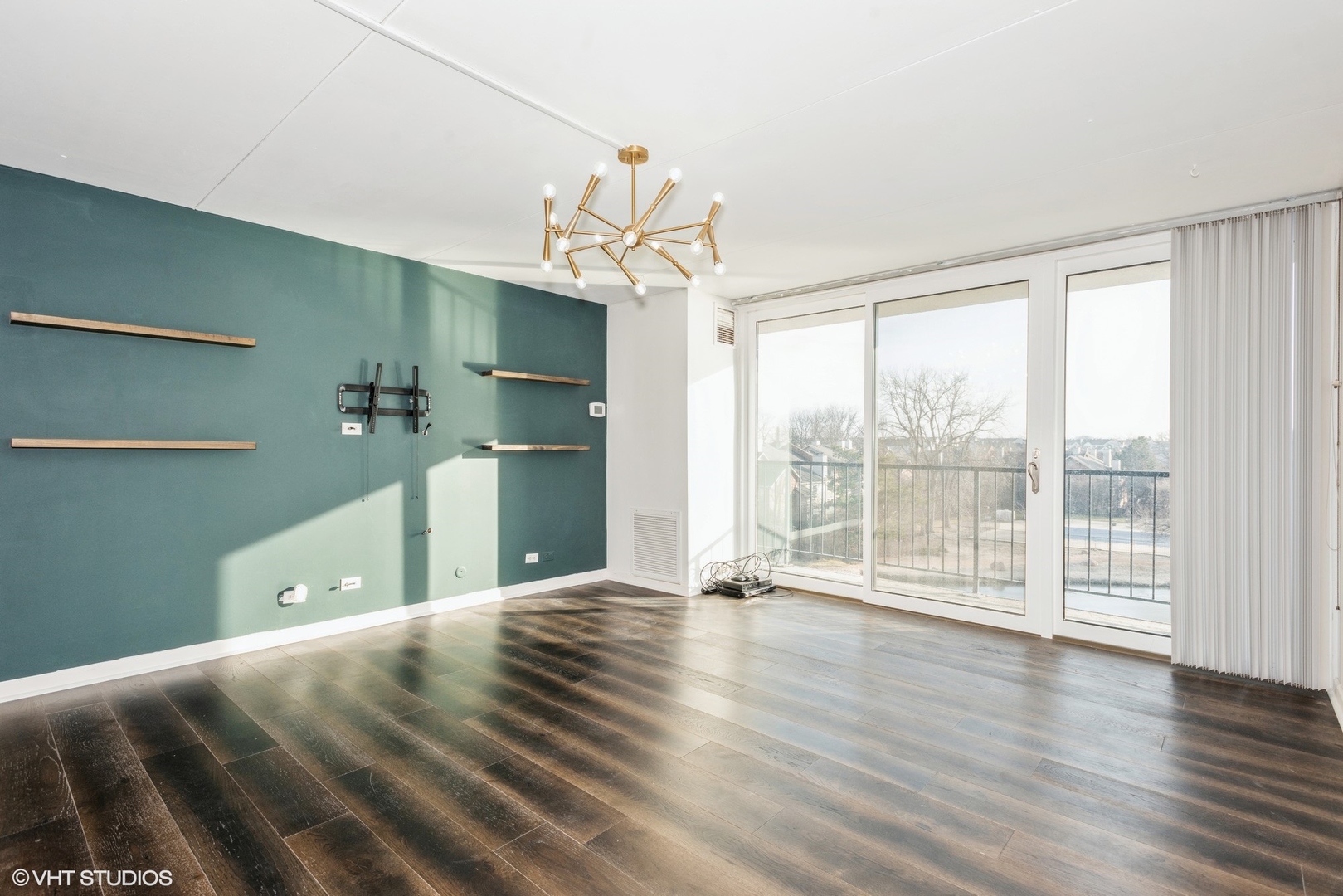2015 South Finley Road, Unit 403 Lombard, IL 60148 - Photo 8 of 19 a view of a room with wooden floor and balcony