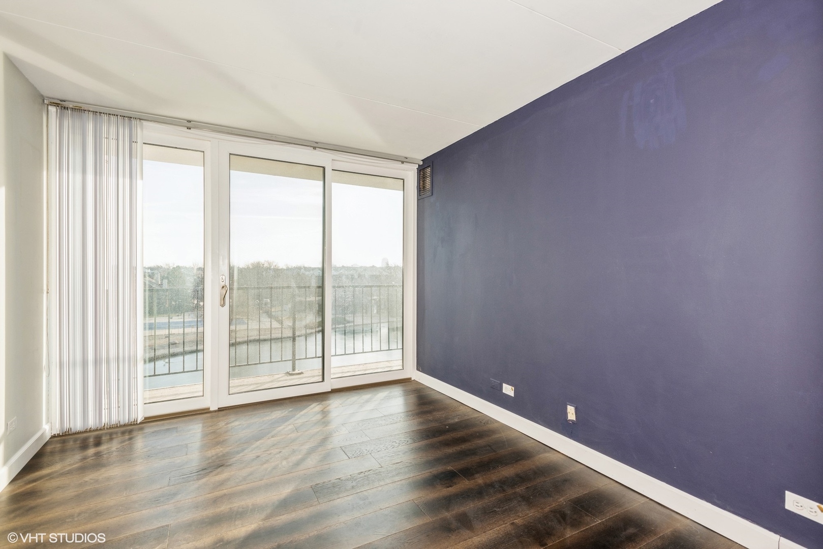 2015 South Finley Road, Unit 403 Lombard, IL 60148 - Photo 10 of 19 wooden floor in an empty room with a window