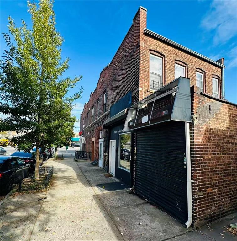 74 Quentin Road Brooklyn, NY 11223 - Photo 3 of 9 a pathway of a house with a yard