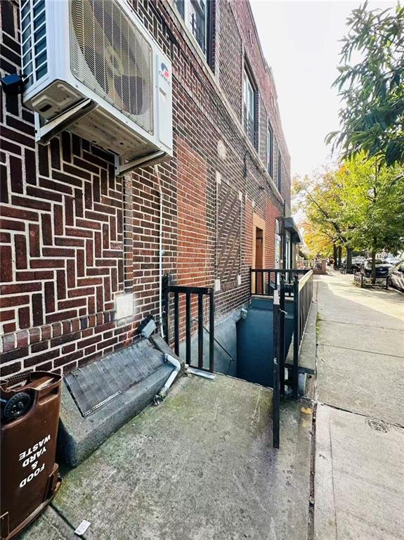 74 Quentin Road Brooklyn, NY 11223 - Photo 4 of 9 a view of a patio with a table and chairs