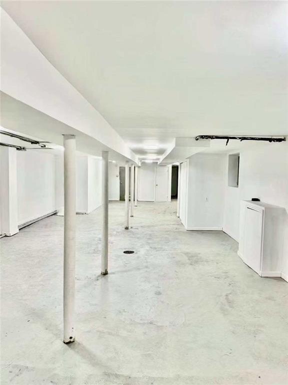 74 Quentin Road Brooklyn, NY 11223 - Photo 8 of 9 a view of a bathroom with a shower