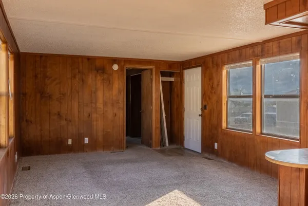 an empty room with windows