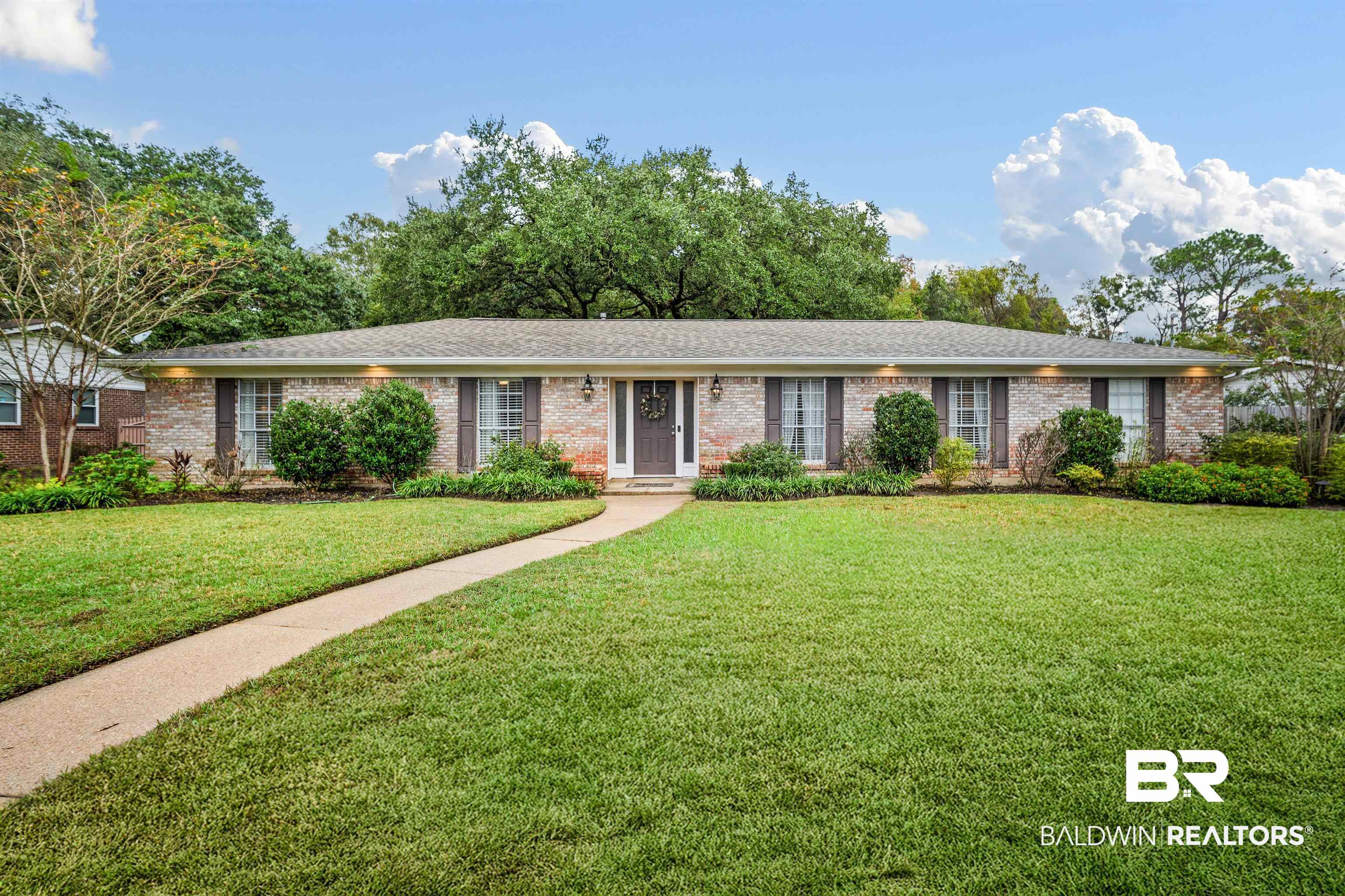 4228 Spring Valley Drive South Mobile, AL 36693 - Photo 1 of 31 Ranch-style house with a front yard