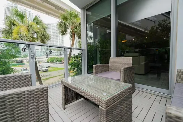 a bathroom with a sink a mirror and a bathtub