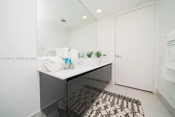 a sink with a mirror