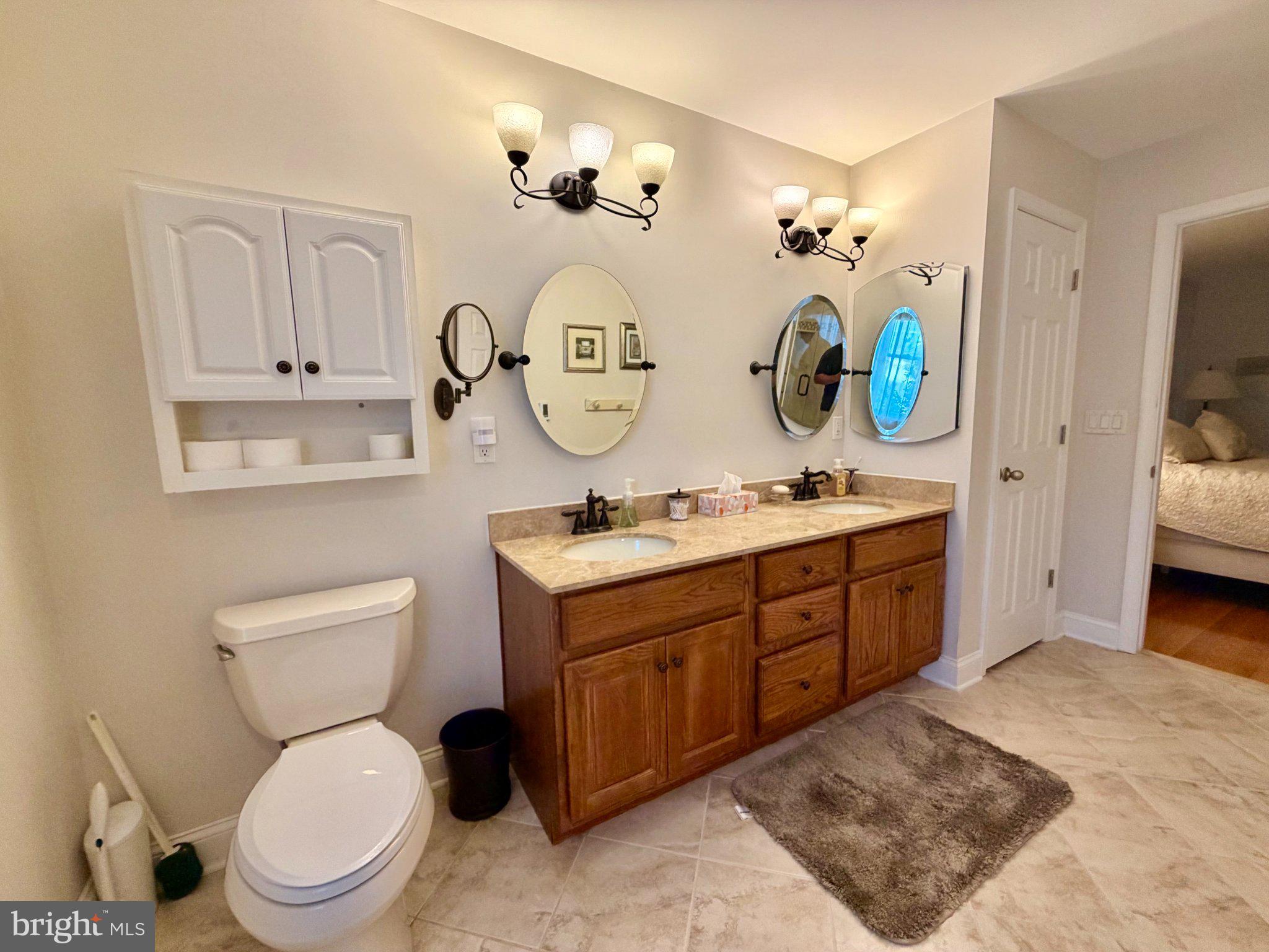 211 William Cook Boulevard Manahawkin, NJ 08050 - Photo 48 of 71 Elegant bathroom with dual vanities.