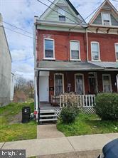 68 End Trenton, NJ 08618 - Photo 1 of 5 front view of a house with a yard