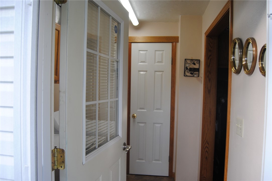 310 Janeway Street Kane, PA 16735 - Photo 13 of 32 Back door to laundry, cleaning closet, and half ba
