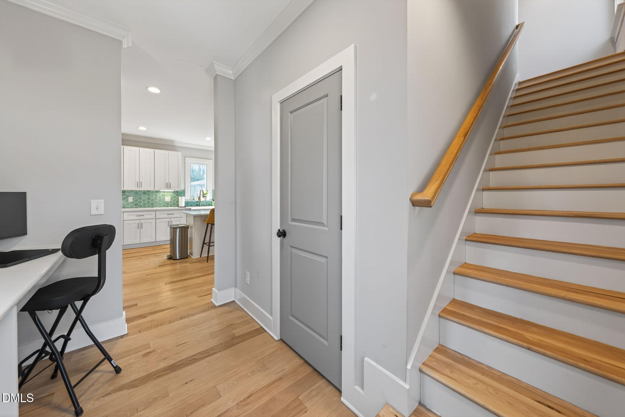 213 Lincoln Court Raleigh, NC 27610 - Photo 22 of 40 a view of a hallway with chairs and wooden floor