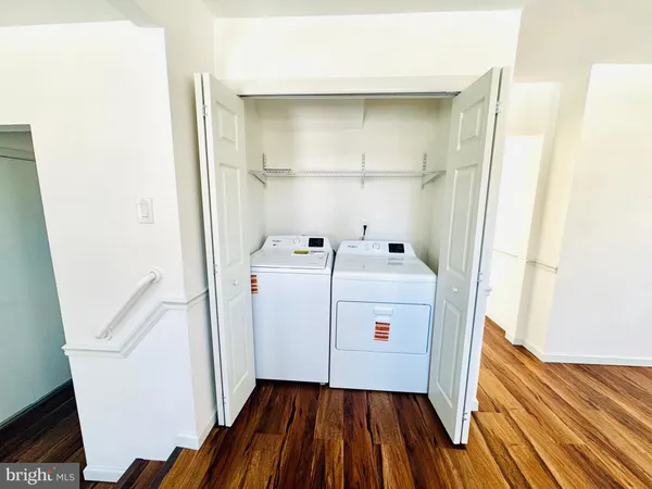 a utility room with dryer and washer