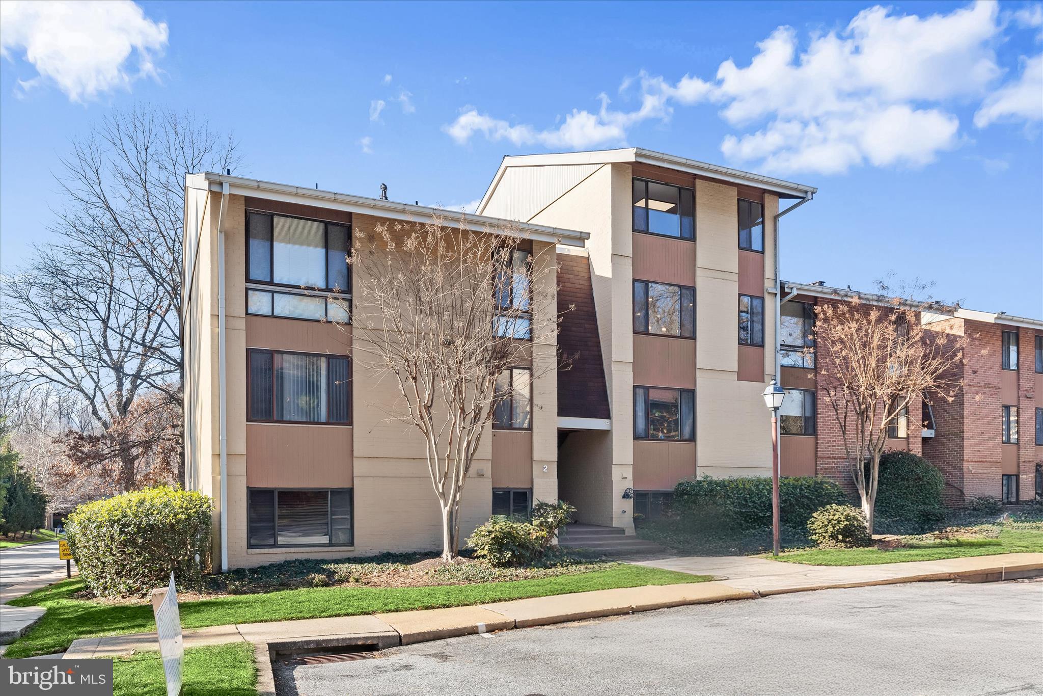 2 Cross Keys Road, Unit 2F Baltimore, MD 21210 - Photo 33 of 36 a front view of a house with garden