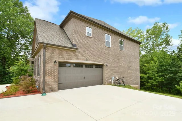 a front view of a house with a garage