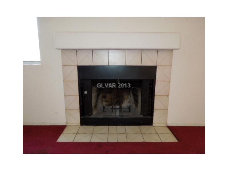 269 Westwind Road Henderson, NV 89074 - Photo 9 of 35 Living Room. Wood burning Fireplace!!!
