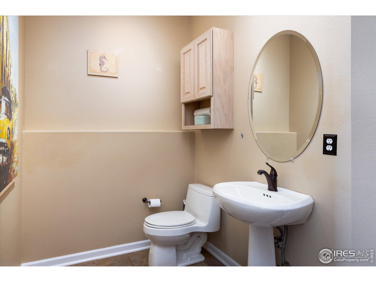 5251 Olde Stage Road Boulder, CO 80302 - Photo 15 of 39 a bathroom with a toilet sink and mirror
