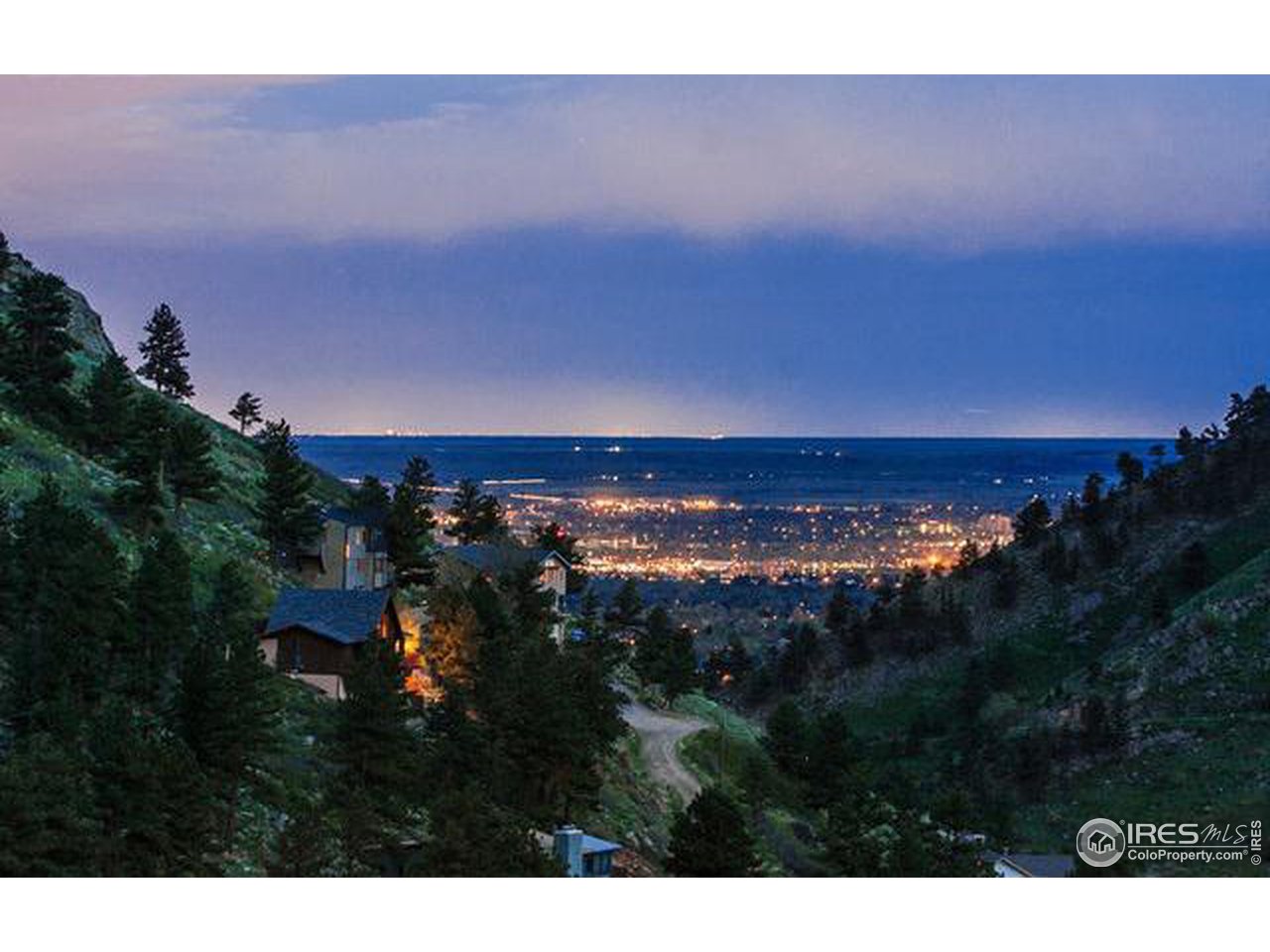 5251 Olde Stage Road Boulder, CO 80302 - Photo 2 of 39 a view of a city with sunset