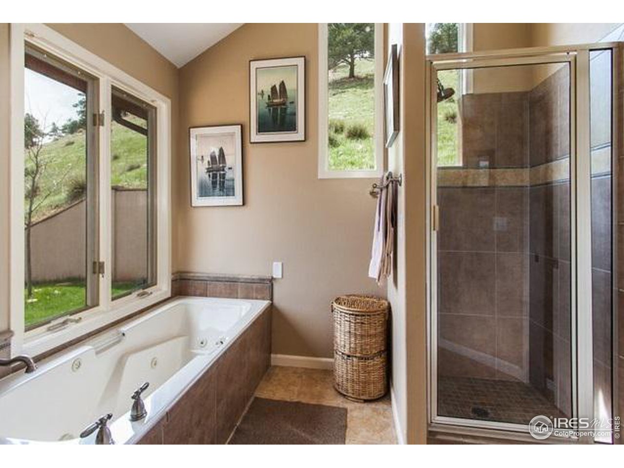 5251 Olde Stage Road Boulder, CO 80302 - Photo 21 of 39 a bathroom with a bathtub and a shower