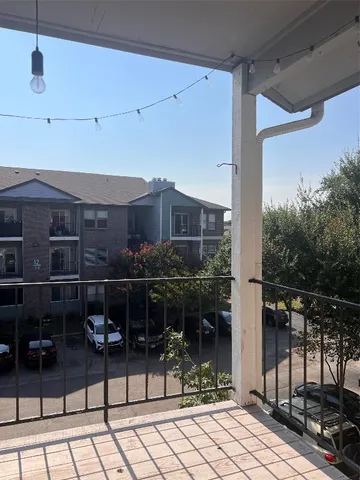 a view of pool with a backyard