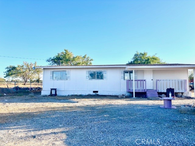 9950 Sonora Road Phelan, CA 92371 - Photo 2 of 6 a view of a swimming pool with an outdoor seating
