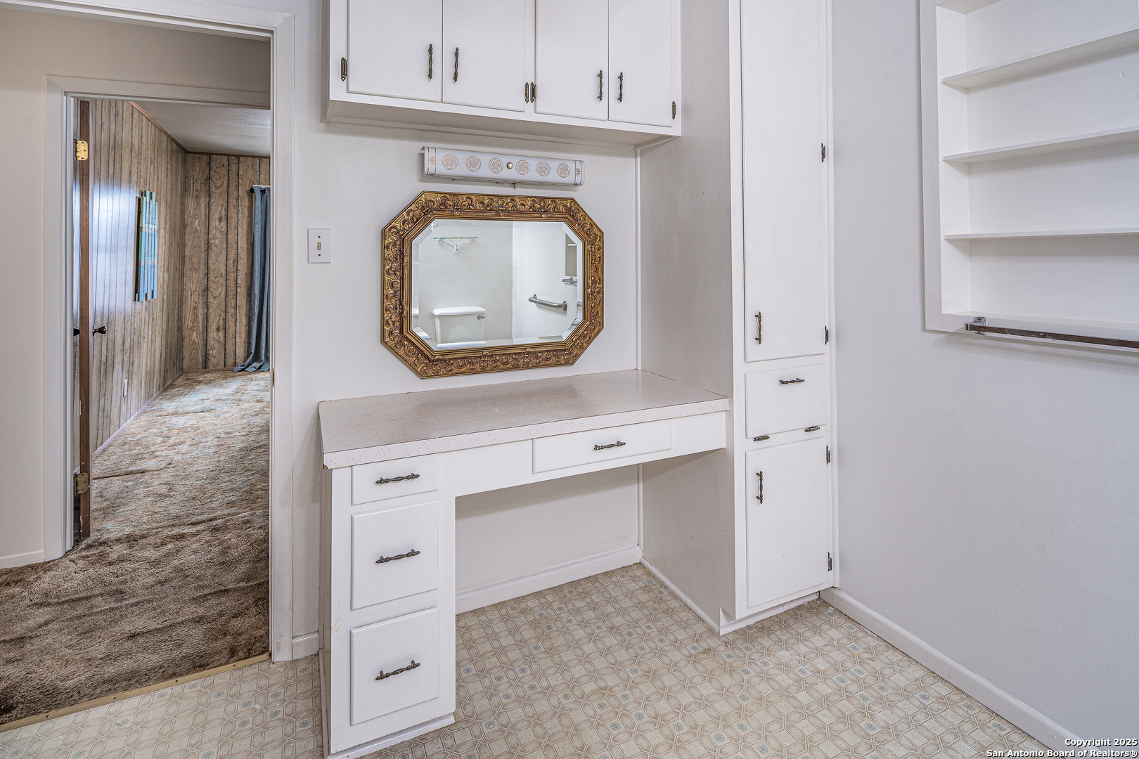 611 Austin Street Sabinal, TX 78881 - Photo 20 of 45 a view of cabinets a washer and dryer