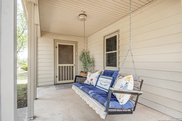a view of porch with seating space