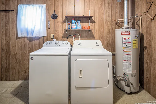 a utility room with dryer and washer