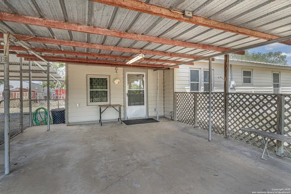 a view of outdoor space with a balcony