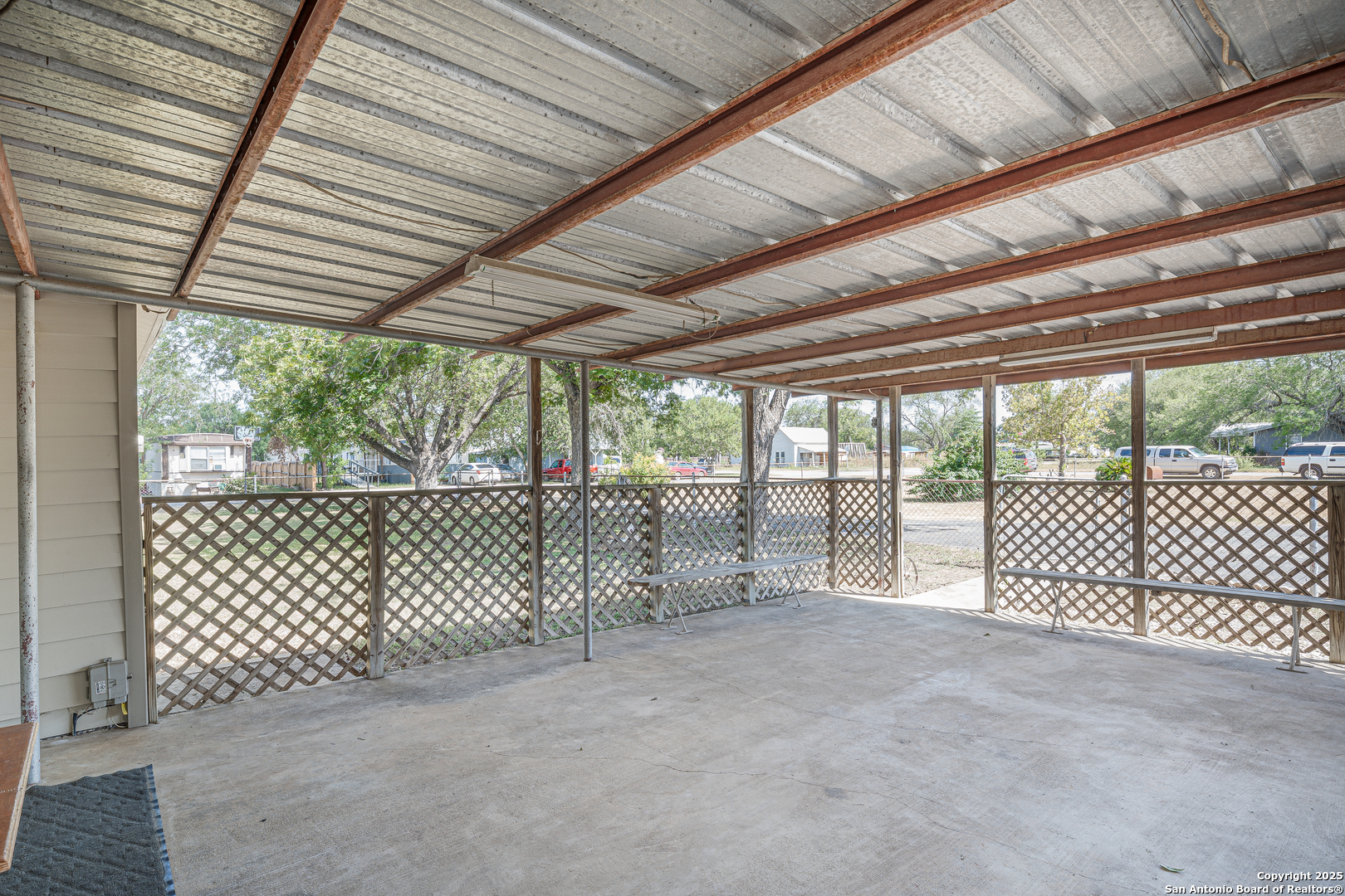611 Austin Street Sabinal, TX 78881 - Photo 27 of 45 a view of outdoor space with a balcony