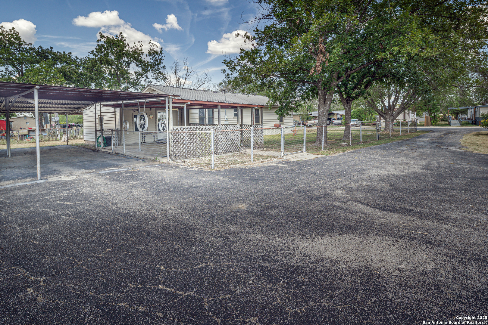 611 Austin Street Sabinal, TX 78881 - Photo 30 of 45 a view of house with outdoor space