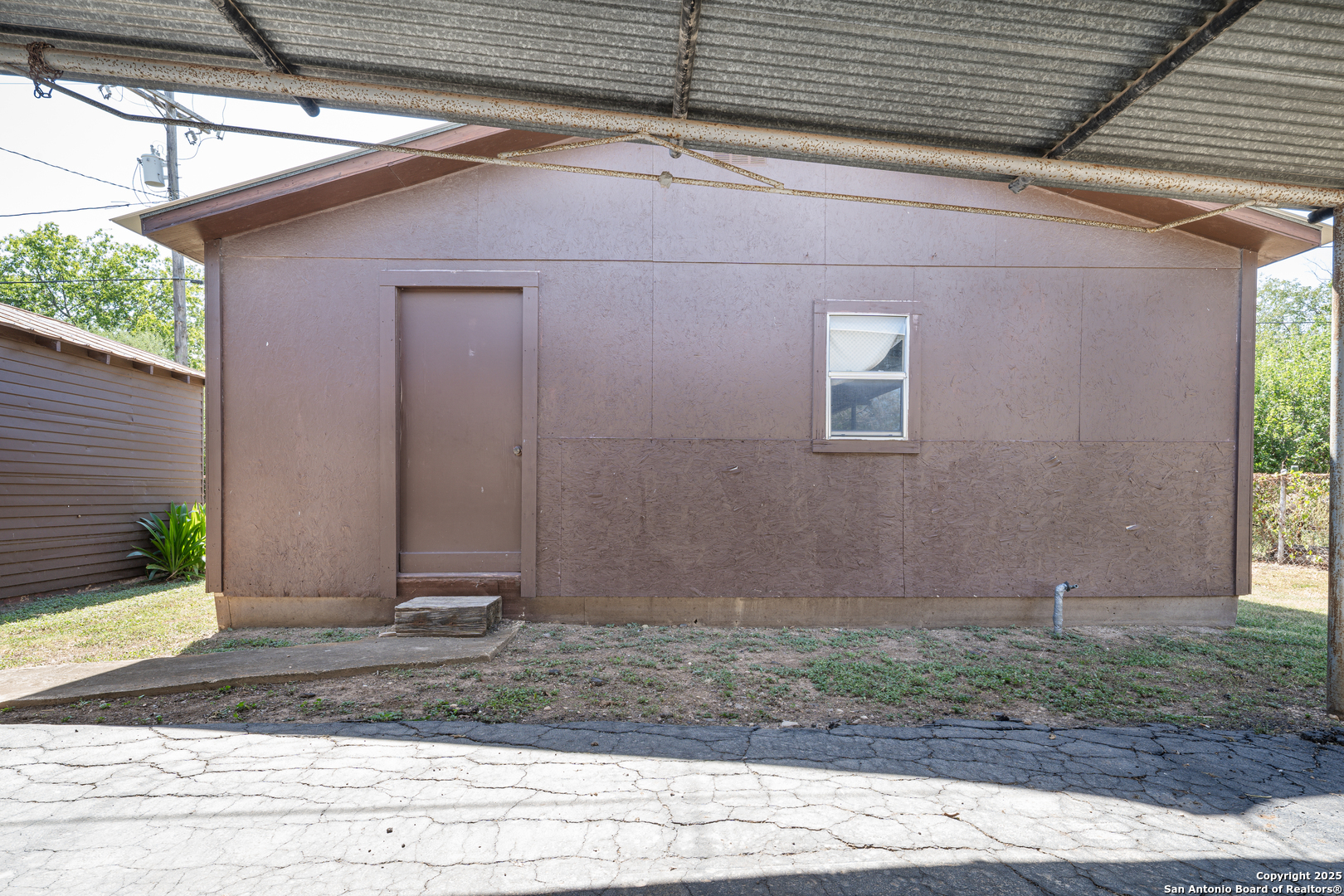 611 Austin Street Sabinal, TX 78881 - Photo 35 of 45 a view of a backyard