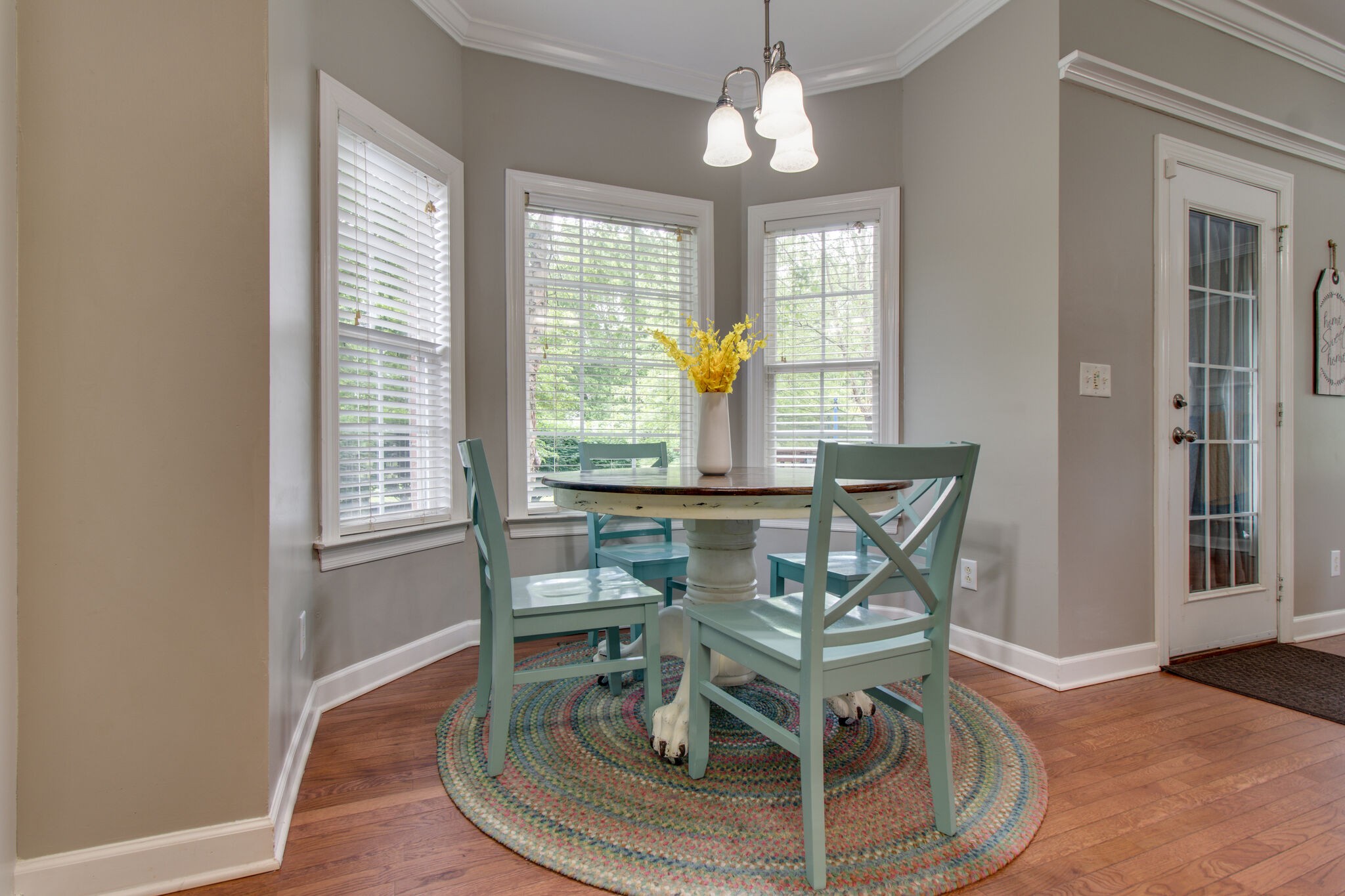 1933 Victorian Road Columbia, TN 38401 - Photo 13 of 20 a dining room with wooden floor and a chandelier