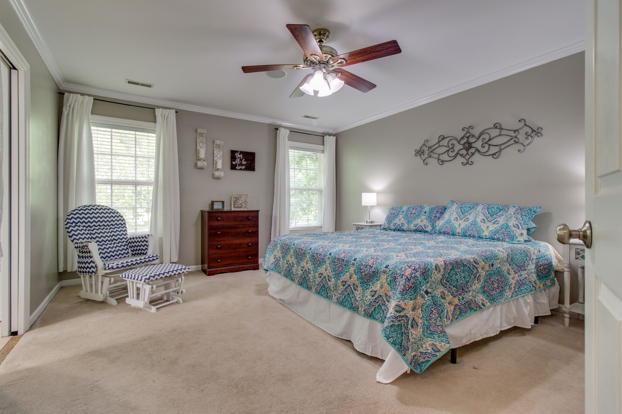 1933 Victorian Road Columbia, TN 38401 - Photo 16 of 20 a spacious bedroom with a bed and a chandelier