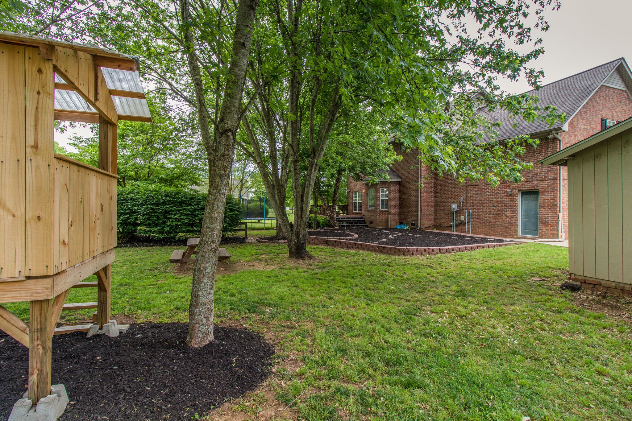 1933 Victorian Road Columbia, TN 38401 - Photo 20 of 20 a backyard of a house with barbeque oven