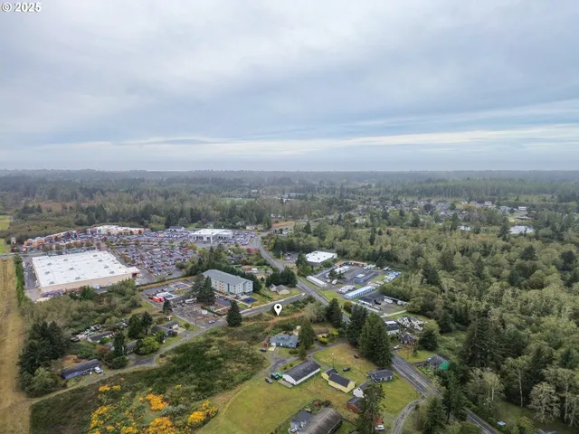 a view of a garden with an outdoor seating